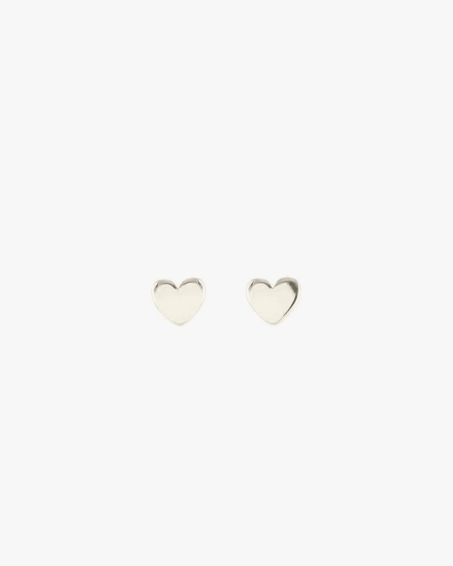 Tiny Heart Stud Earrings in Sterling Silver